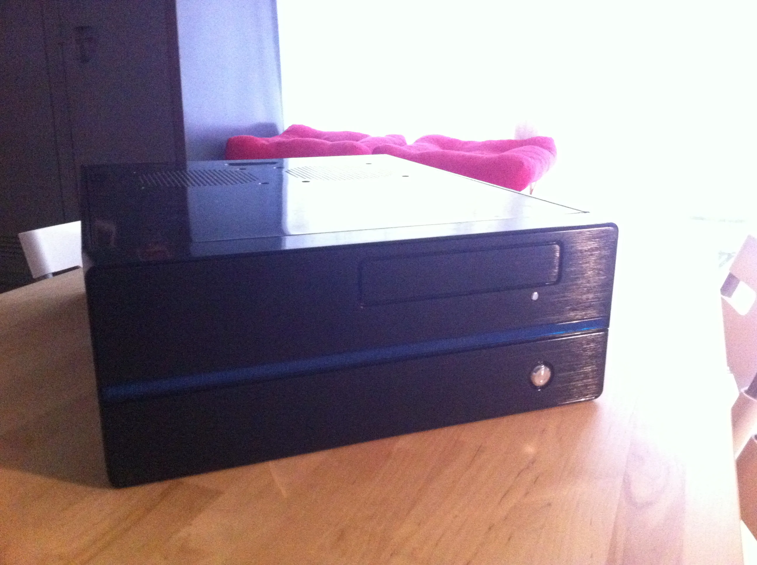 The homemade PC home server in a horizontal black case