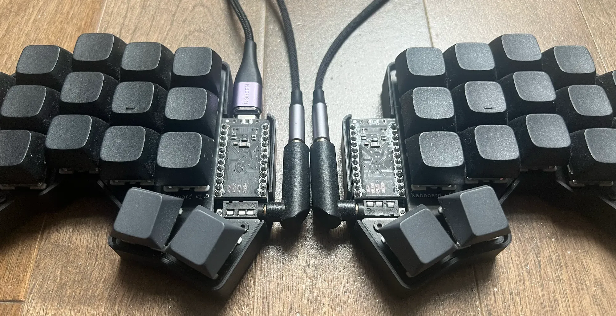 Custom split keyboard layout called Kahboard with compact column-staggered keys and thumb clusters